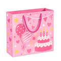 Sacchetto regalo 26 x 12 x 32 cm in carta rosa con manici intrecciati - compleanno